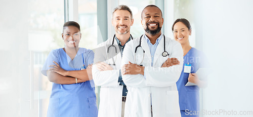 Image of Lets start this day the way we always do. a group of medical practitioners standing together in a hospital.