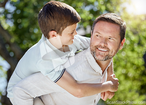 Image of How fast should we go. a man spending time outdoors with his young son.