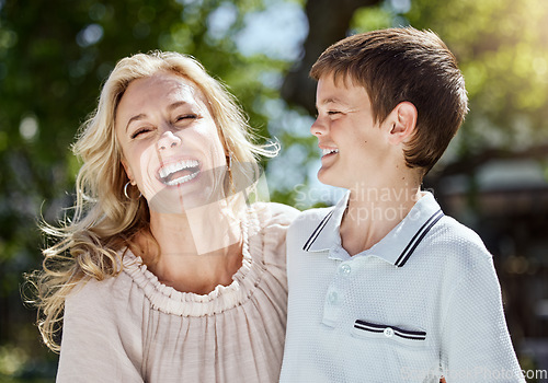 Image of My son is quite a jokester. a woman spending time outdoors with her young son.