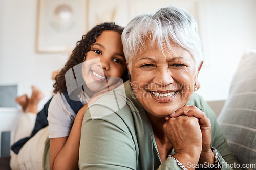 Image of Dont lose your smile. a grandmother spending time with her grandchild at home.