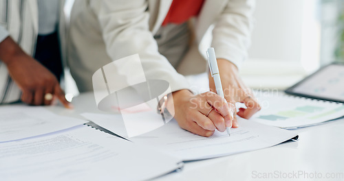 Image of Hands, documents and women writing for signature, agreement or contract for b2b deal in office. Business people, paperwork and pen for sign, report or financial proposal with compliance in workplace