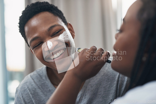 Image of More glow, less gender roles. a young couple getting homemade facials together at home.