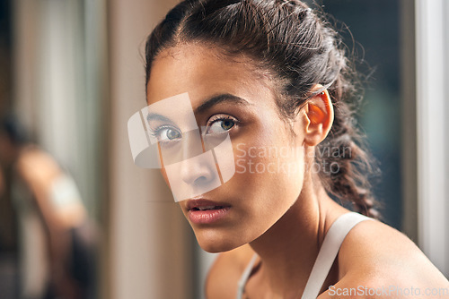 Image of Looking for me Im in the gym. Cropped portrait of an attractive young female athlete in the gym.