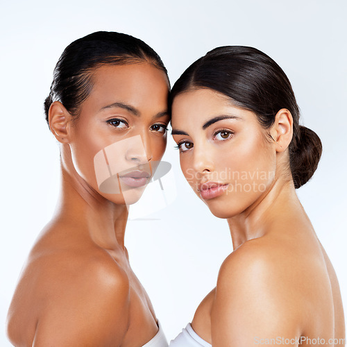 Image of Let your difference bring you together. Studio shot of beautiful young women posing against a grey background.