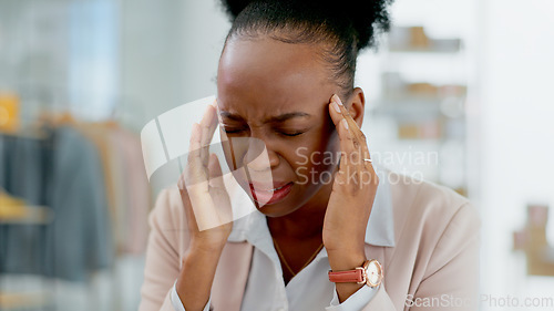 Image of Business, stress and black woman with headache in office frustrated by brain fog, pain or crisis. Anxiety, face and African female fashion designer with vertigo, migraine or mistake, disaster or fail