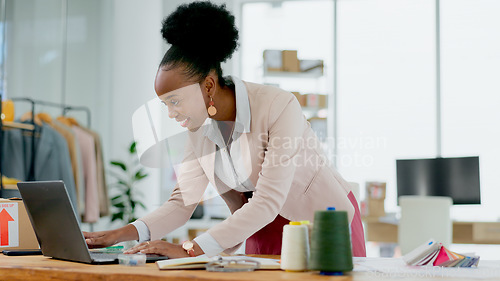 Image of Happy black woman, laptop and fashion designer in small business, office or ideas at boutique store. African female person smile working on computer in logistics for clothing or schedule delivery