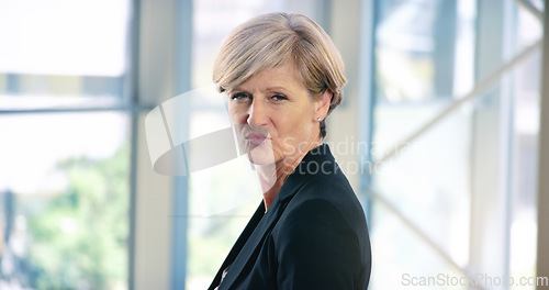 Image of Expressing herself as she wants. Portrait of a mature businesswoman pouting in an office.