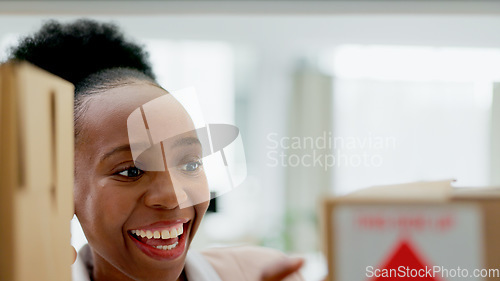 Image of Face, office or business owner with boxes to check shelf for supply chain delivery or mail distribution. Smile, fashion designer or happy black woman excited by courier service in cardboard package