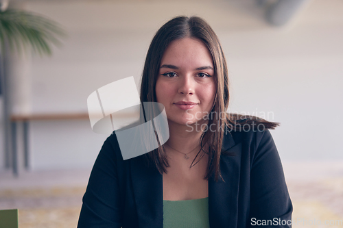 Image of Portrait of a young self-confident entrepreneur in a modern office