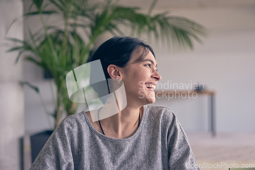 Image of In a modern office, a young smile businesswoman with glasses confidently explains and presents various business ideas to her colleagues, showcasing her professionalism and expertise.