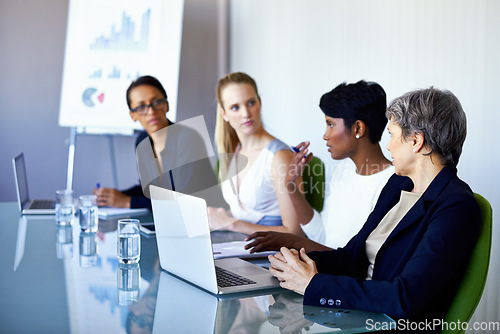 Image of Afternoon strategizing. a group of coworkers having a meeting in the boardroom.