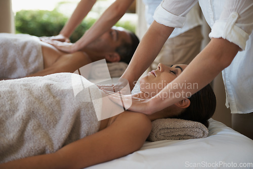 Image of The soft, soothing touch of expert hands. a mature couple enjoying a relaxing massage.