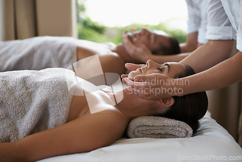 Image of Miracle inducing hands. a mature couple enjoying a relaxing massage.