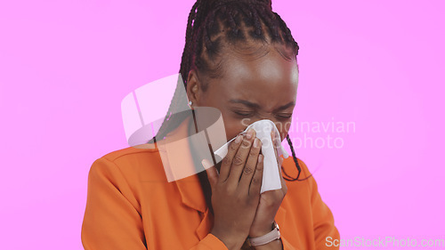 Image of Black woman, blowing nose and sick with allergies, sneezing and sinus infection with health on pink background. Hay fever, wellness and toilet paper, medical condition with illness or virus in studio