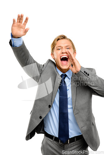 Image of Hey, can I have your attention. a handsome young businessman standing alone in the studio and yelling.