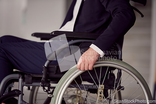 Image of Closeup photo of a businessman in a wheelchair