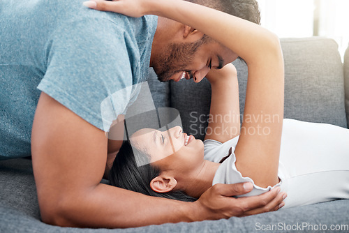 Image of Youre my everything. a young couple bonding and sharing an intimate moment in their new home.