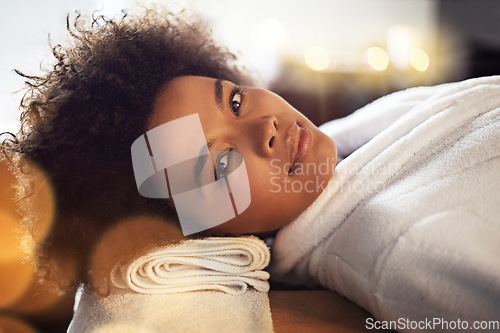 Image of Feeling restored, relaxed and totally at peace. a beautiful young woman relaxing at a beauty spa.