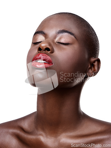 Image of Exotic dreams. Studio shot of a beautiful young african woman isolated on white.