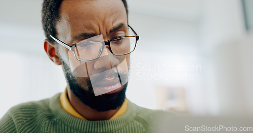 Image of Thinking, black man and a laptop for remote work, email or reading information online. Connection, confused and an African entrepreneur with a computer for entrepreneurship, freelance job or strategy