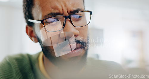 Image of Man, thinking or confused at work laptop or idea, thoughts problem solving. Black person, glasses closeup or job email communication stress or plan doubt, research brainstorming or freelance fail