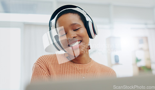 Image of Happy, excited and black woman with headphones, home and streaming music with happiness. African person, apartment and girl with headset, listening to sound and audio with technology, app and radio