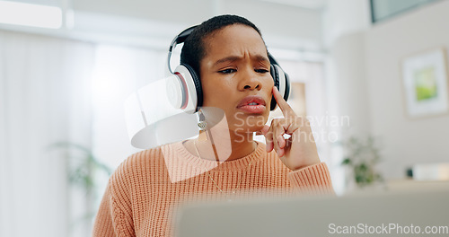 Image of Remote work, black woman and thinking on a laptop for business, online planning or a strategy. House, music and serious African freelance worker with a podcast, headphones and streaming sound on a pc