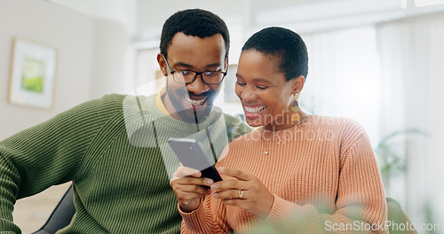 Image of Happy, home phone and relax black couple reading, smile or watch social media video, blog or relationship news. Smartphone, mobile application and African man, woman or marriage people check web info