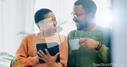 Image of Coffee, home tablet and black couple happy for social media post, morning wellness blog or relationship news. Matcha tea drink, eye contact and African man, woman or marriage people check web info