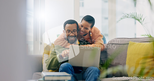 Image of Happy, couple hug and laptop for social media, internet search or reading an email. Smile, love and an African man and woman with care, connection and a computer for a movie, show or film together