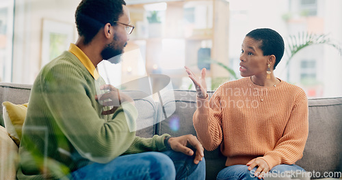 Image of Conflict, conversation and a black couple with a fight in marriage for relationship stress or problem. House, communication and an African man and woman speaking about a divorce, breakup or mistake