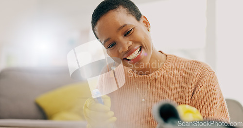 Image of Cleaning, happy and woman with spray for furniture in living room for hygiene, housework and maintenance. Housekeeping, products and person with gloves for bacteria, dirt and dust on surface in home