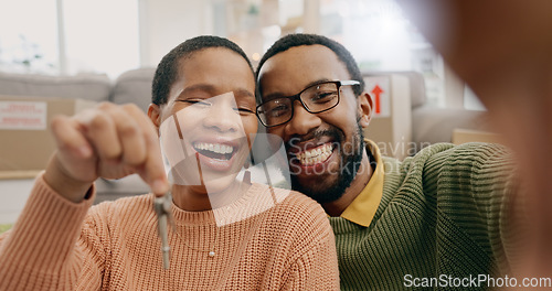 Image of Black couple, portrait and a selfie with keys in a new home after moving and relocation. Smile, showing and an African man and woman excited with a photo for ownership or buying of a house together