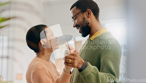 Image of Home, dancing and black couple with love, marriage and romance with lens flare, smile and care. Romantic, man and woman with energy, relationship and celebration with support, anniversary and joy