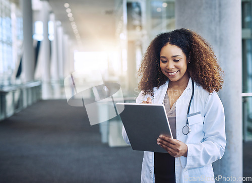 Image of With the right tools, you can save lives. a female doctor using a digital tablet.