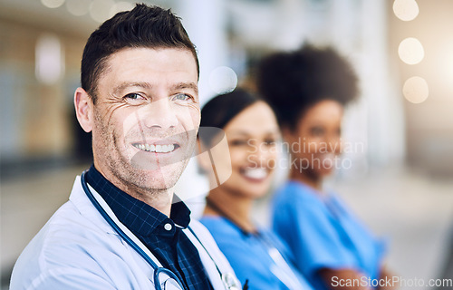 Image of The best in the medical field. Defocused shot of a group of medical practitioners standing together.