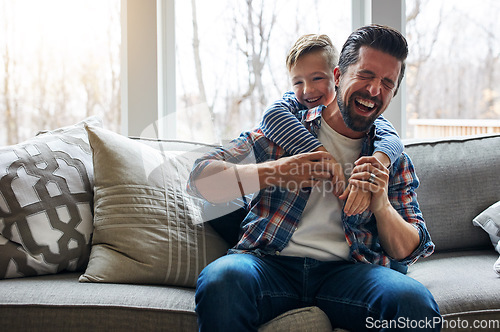 Image of Kids bring so much delight to each day. a father and his little son bonding together at home.