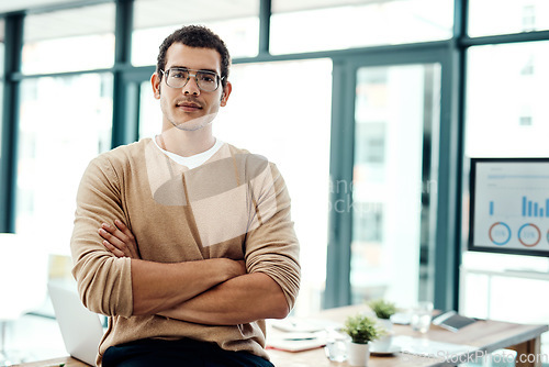 Image of Here to turn my dreams into big successes. Portrait of a young designer standing in an office.