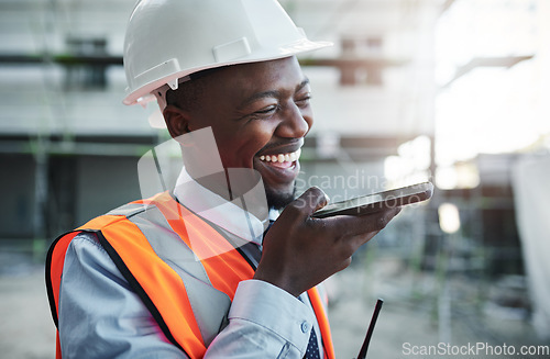 Image of Business hours are for building customer relationships. a young man using a smartphone while working at a construction site.