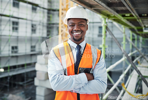 Image of Meet the man whos giving his city a makeover. Portrait of a confident young man working at a construction site.