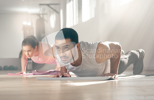 Image of If you want better results, make better choices. two young athletes working out together at the gym.