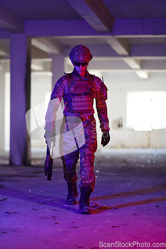 Image of A professional soldier undertakes a perilous mission in an abandoned building illuminated by neon blue and purple lights