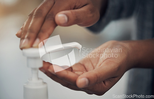 Image of Kill the bacteria, break the cycle. an unrecognisable man disinfecting his hands with hand sanitiser.