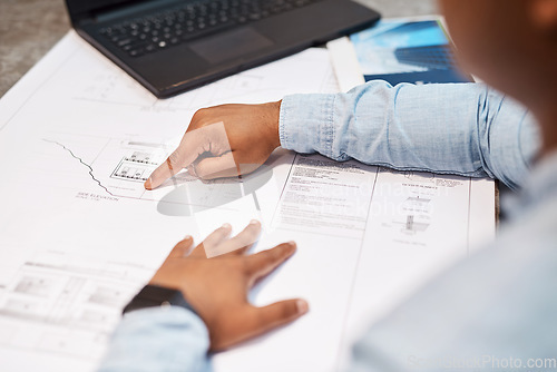 Image of The finest talent in the architectural business. an unrecognisable architect drawing up a building plan in a modern office.