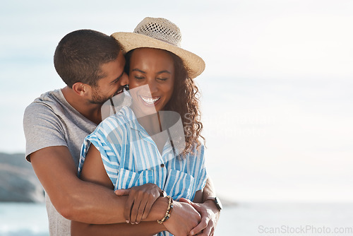 Image of I promise to love you endlessly. a young couple enjoying some quality time together at the beach.