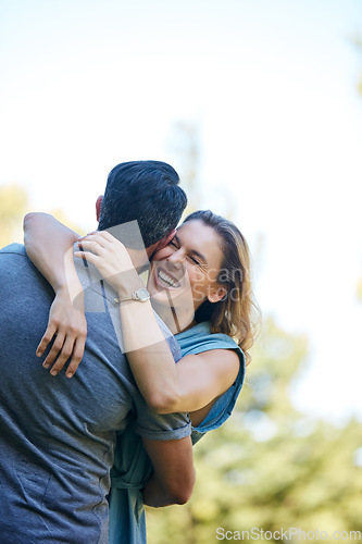 Image of Possessions are immaterial, love is the true gold. a happy couple embracing in the park.