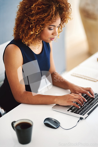 Image of Creating your own business has never been easier. a young businesswoman working on her laptop.