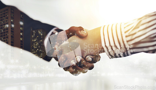 Image of When opportunity presents itself, grab it. Closeup shot of two unrecognizable businesspeople shaking hands in an office.