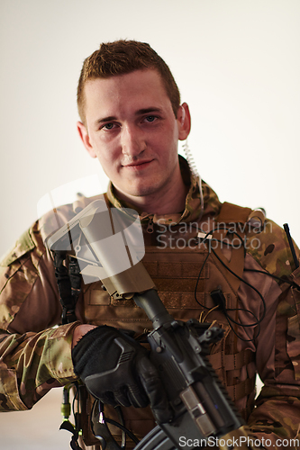 Image of Modern warfare soldier portrait in urban environment