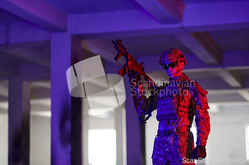 Image of A professional soldier undertakes a perilous mission in an abandoned building illuminated by neon blue and purple lights
